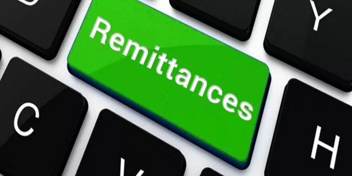 A cross-section of a keyboard with a key labeled “Remittances”
