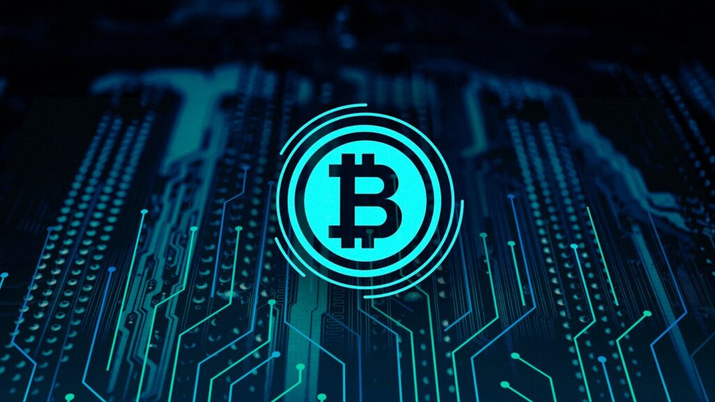 Holographic bitcoin logo on motherboard 