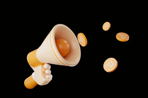 Megaphone shooting out crypto coins