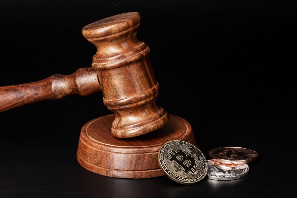 Law mallet and a stack of money.