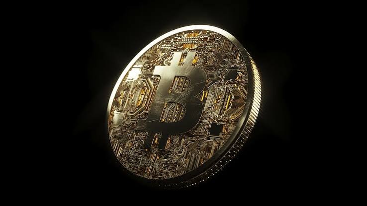 Bitcoin on a black surface