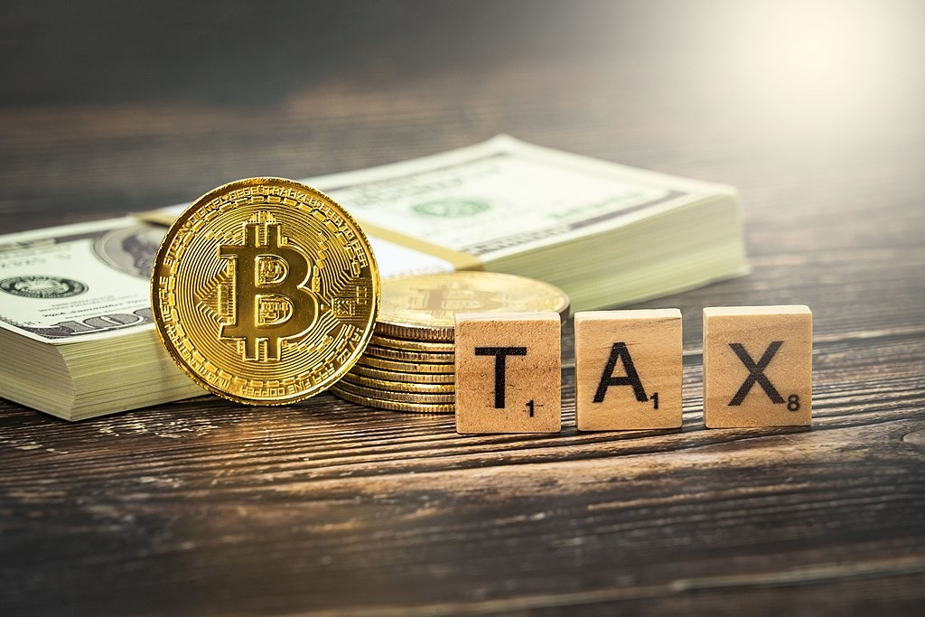 Bitcoin medallions and the word “tax”