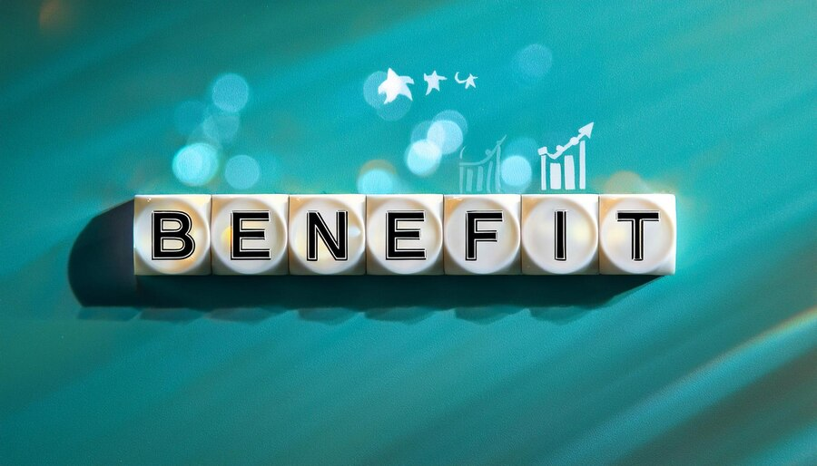 The word benefit spelled on white blocks against a teal background