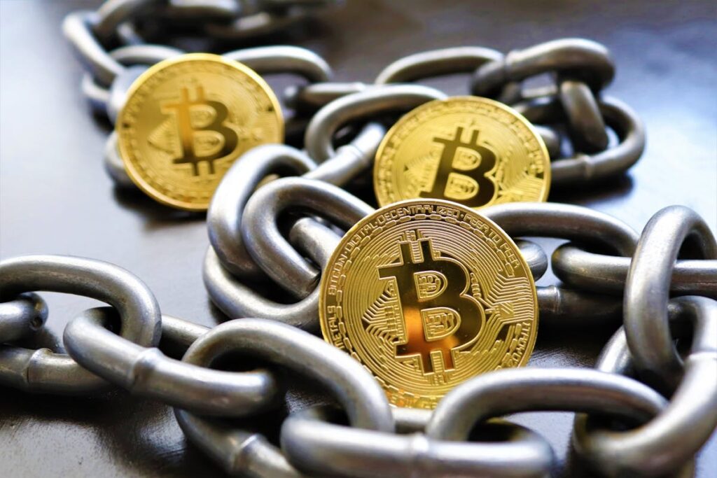 Close Up of Bitcoins With Chains 