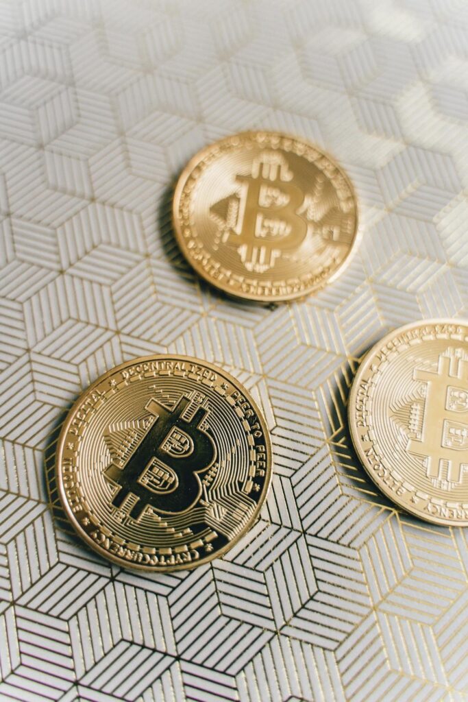 Golden Bitcoins in Close Up Photography 
