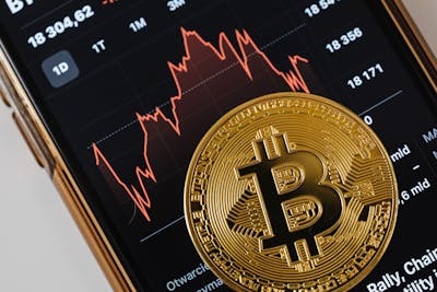 A Gold Coin on a Smartphone Screen
