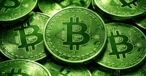 stacked of Bitcoin coins with a green tint, showing the BTC logo and circuit design.