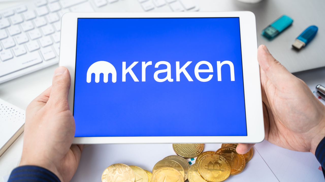 Kraken symbol with gold bitcoin and flashdrive